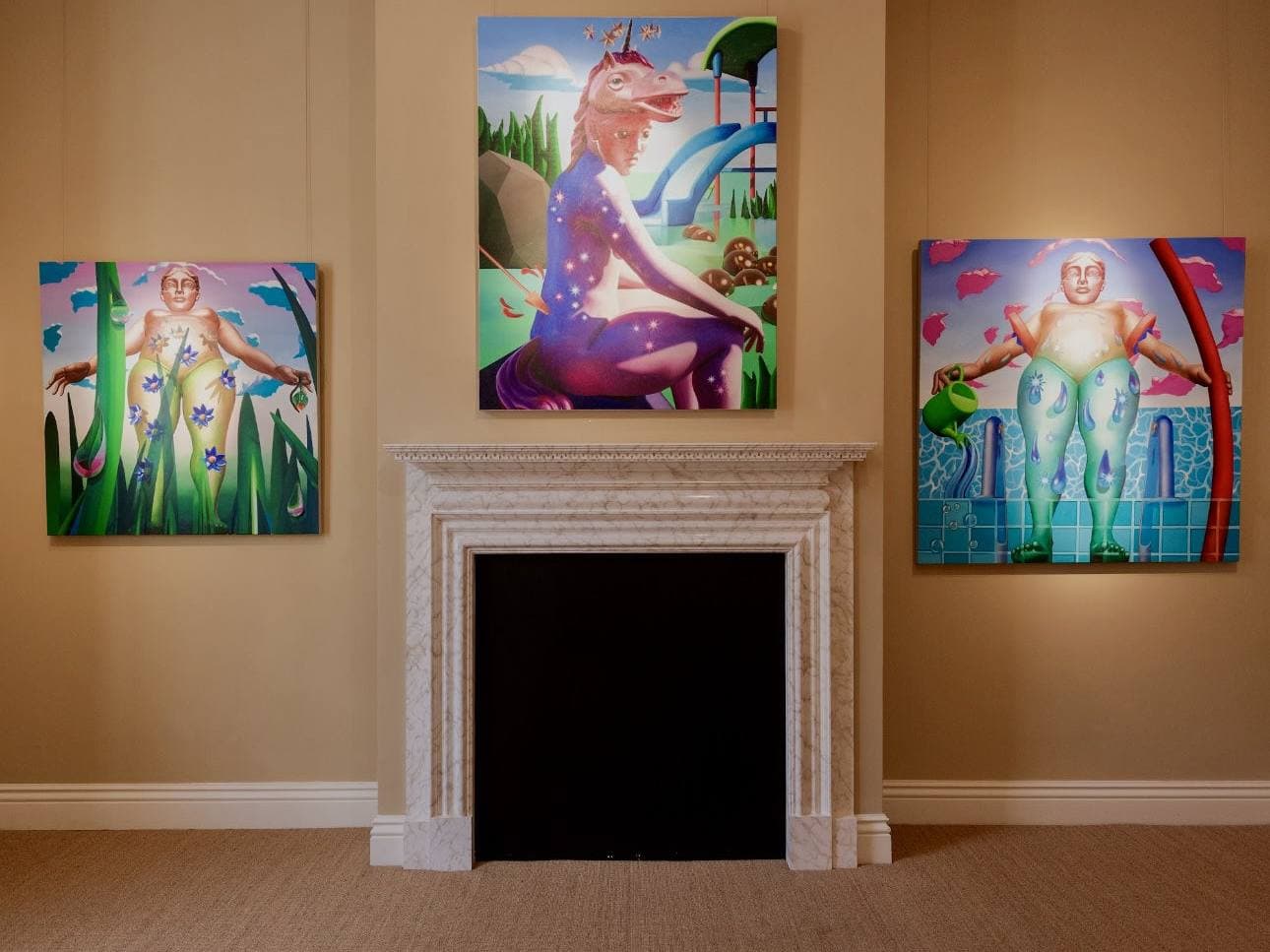 A townhouse gallery room with a fireplace and paintings