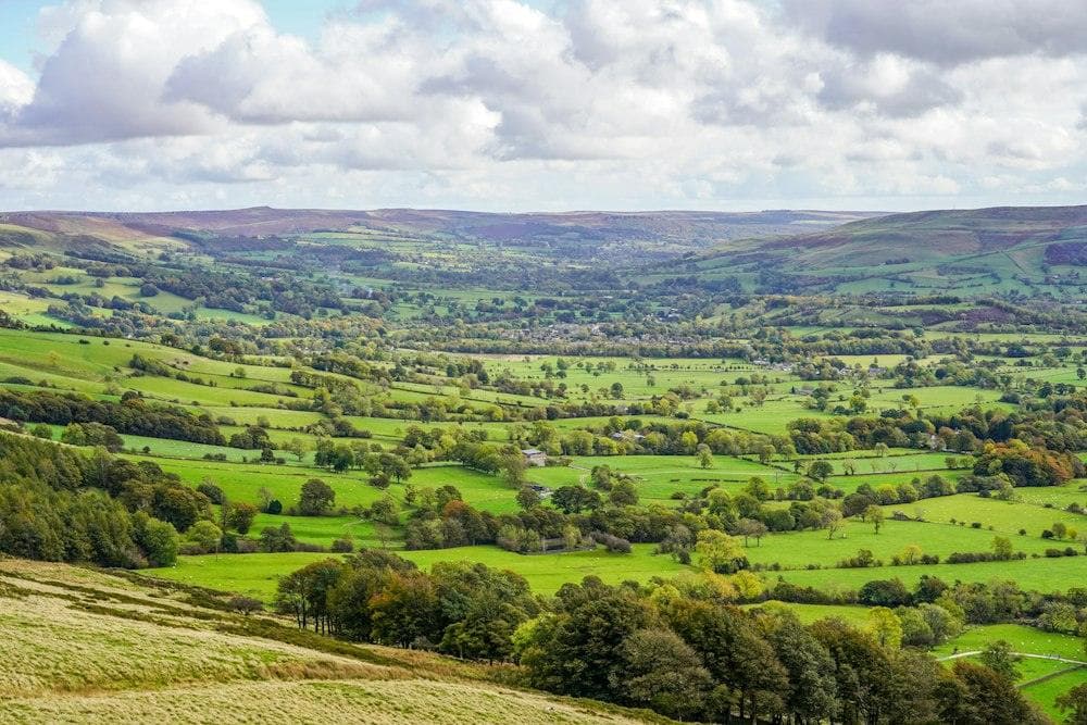 The Hope Valley seen from above, green and wooded